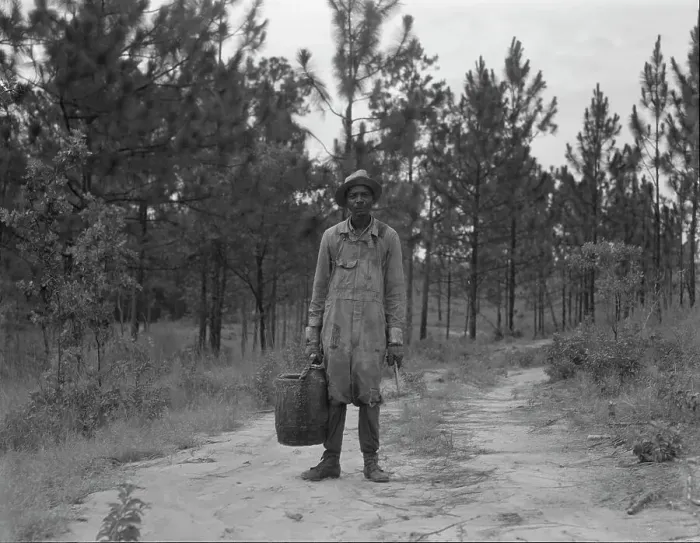 Framed Print : Turpentine dipper near Waycross, Georgia, 1937. Creator: Dorothea Lange