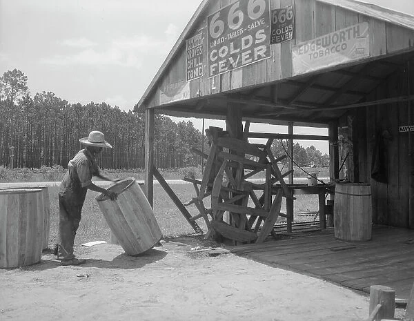 Turpentine still near Valdosta, Georgia, 1937. Creator: Dorothea Lange