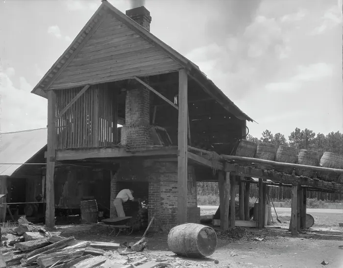 Framed Print : Turpentine still in the Piney Woods near Valdosta, Georgia, 1937. Creator: Dorothea Lange Framed Print : Turpentine still in the Piney Woods near Valdosta, Georgia, 1937. Creator: Dorothea Lange