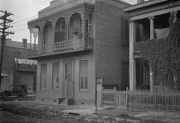 Two-story houses, New Orleans, between 1920 and 1926. Creator: Arnold Genthe