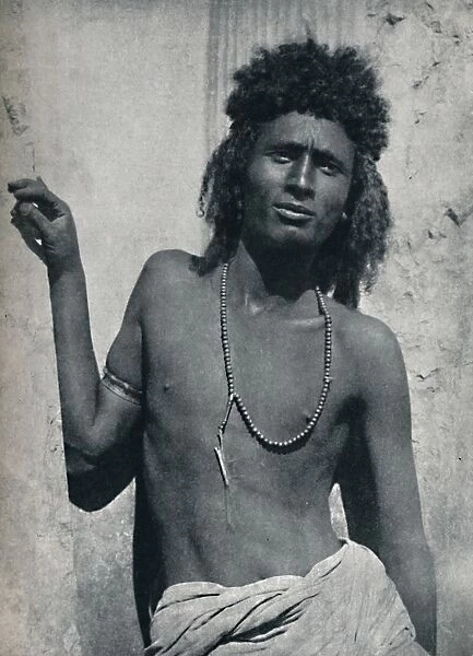 A typical Ethopian from the Nile Valley, near its junction with the Atbara, 1912. Artist: G Pluschow