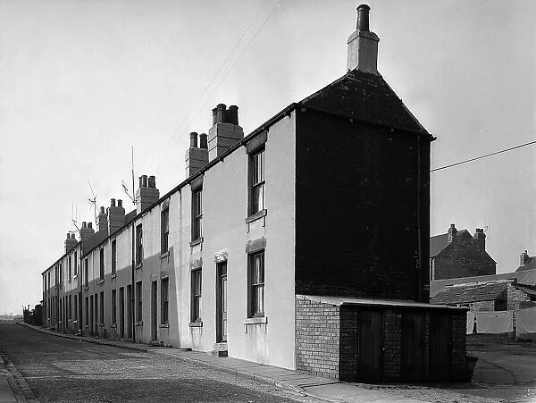 Typical mining town terrace, Queen Street, Swinton, South Yorkshire, 1957. Artist