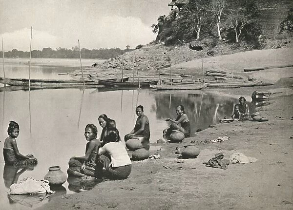 Typical Riverside Scene on the great Irrawaddy - Women bathing and drawing water, 1900