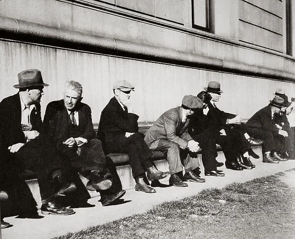 Unemployed men sitting outside the Public Library, San Francisco, California, USA, February 1937