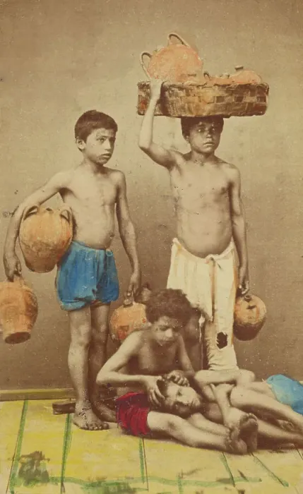 Framed Print : Four unidentified boys: two standing with clay pots, two seated with one being checked... 1865-1870 Creator: Giorgio Conrad Framed Print : Four unidentified boys: two standing with clay pots, two seated with one being checked... 1865-1870 Creator: Giorgio Conrad