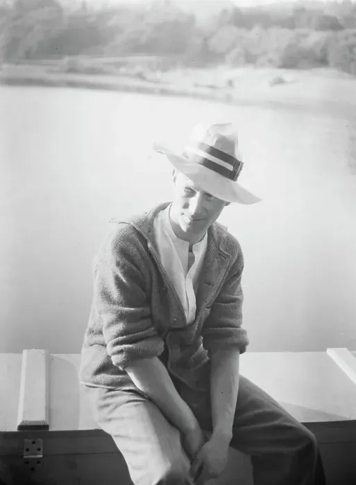 Framed Print : Unidentified man, seated in front of water, between 1896 and 1942. Creator: Arnold Genthe Framed Print : Unidentified man, seated in front of water, between 1896 and 1942. Creator: Arnold Genthe