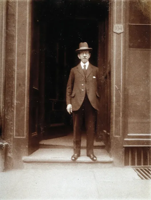 Framed Print : An unidentified man standing in a doorway, 1926. Creator: William Brown Framed Print : An unidentified man standing in a doorway, 1926. Creator: William Brown