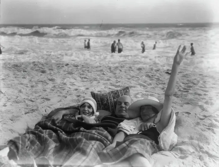 Framed Print : Unidentified man and two women at Long Beach, New York, between 1911 and 1942. Creator: Arnold Genthe Framed Print : Unidentified man and two women at Long Beach, New York, between 1911 and 1942. Creator: Arnold Genthe