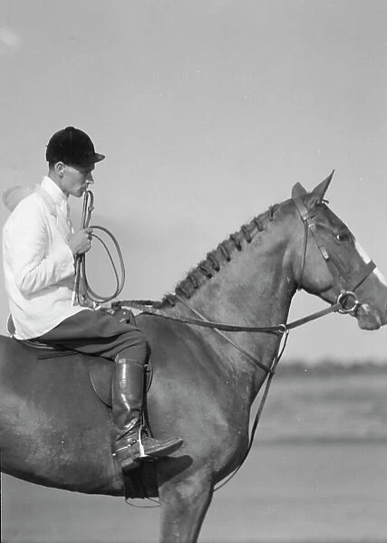 Unidentified person on a horse, between 1911 and 1942. Creator: Arnold Genthe