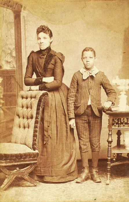 Framed Print : Unidentified standing figures: woman, her folded arms leaning on back of chair... 1890. Creator: J. N. Wilson Framed Print : Unidentified standing figures: woman, her folded arms leaning on back of chair... 1890. Creator: J. N. Wilson