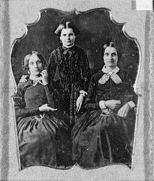 Three unidentified women, two seated, one standing, facing front, between 1840 and 1860. Creator: Unknown