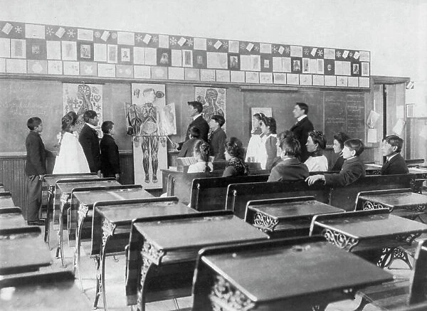 United States Indian School, Carlisle, Pa.: Class studying anatomy, 1901. Creator: Frances Benjamin Johnston