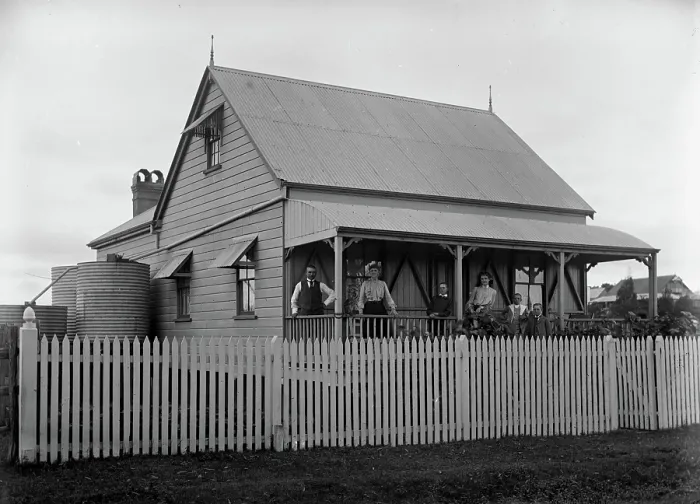 Framed Print : Unknown family portrait and family with monkey on verandah, c1900s Framed Print : Unknown family portrait and family with monkey on verandah, c1900s