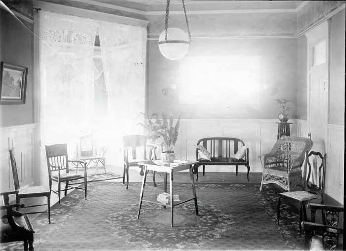 Framed Print : Unknown interior of Victorian family home with fine furniture, brass bed, c1900s Framed Print : Unknown interior of Victorian family home with fine furniture, brass bed, c1900s