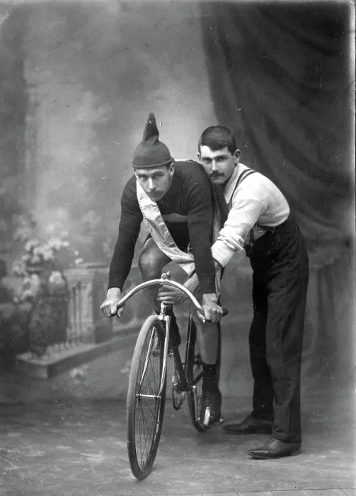 Framed Print : Unknown man on a bicycle, studio portrait (Championship of Queensland sash / ribbon), 1905 Framed Print : Unknown man on a bicycle, studio portrait (Championship of Queensland sash / ribbon), 1905