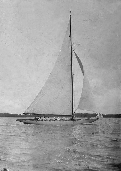 Unknown sailing yacht under way. Creator: Kirk & Sons of Cowes