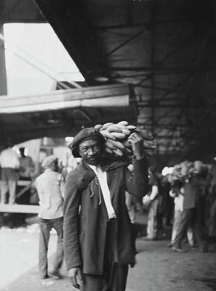 Unloading bananas, New Orleans, between 1920 and 1926. Creator: Arnold Genthe