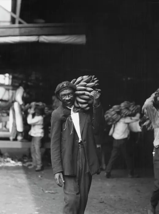 Framed Print : Unloading bananas, New Orleans, between 1920 and 1926. Creator: Arnold Genthe Framed Print : Unloading bananas, New Orleans, between 1920 and 1926. Creator: Arnold Genthe