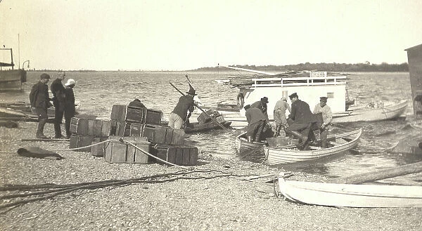 Unloading gasoline from boats on the Zee River during windy conditions, 1909. Creator: Vladimir Ivanovich Fedorov