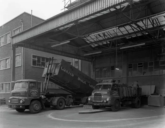 Framed Print : Unloading and loading lorries, Spillers Animal Foods, Gainsborough, Lincolnshire, 1961 Framed Print : Unloading and loading lorries, Spillers Animal Foods, Gainsborough, Lincolnshire, 1961
