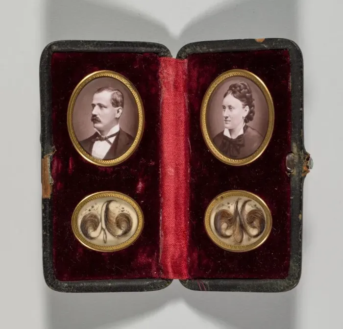 Framed Print : Untitled (Case with portraits of a man and woman and hair ornaments), c. 1870s. Creator Framed Print : Untitled (Case with portraits of a man and woman and hair ornaments), c. 1870s. Creator