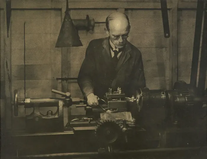 Framed Print : Untitled (Industry; man working lathe), 1920s. Creator: AJ Wales Framed Print : Untitled (Industry; man working lathe), 1920s. Creator: AJ Wales