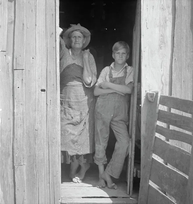 Framed Print : [Untitled]: Woman and boy, 1935. Creator: Dorothea Lange