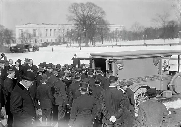 U.S. Capitol - Visitors, Etc. Casket Being Placed In Hearse, 1914. Creator: Harris & Ewing. U.S. Capitol - Visitors, Etc. Casket Being Placed In Hearse, 1914. Creator: Harris & Ewing