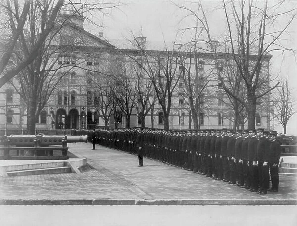 U.S. Naval Academy, Annapolis Md.: cadets lined up in row leading to building, (1902?). Creator: Frances Benjamin Johnston