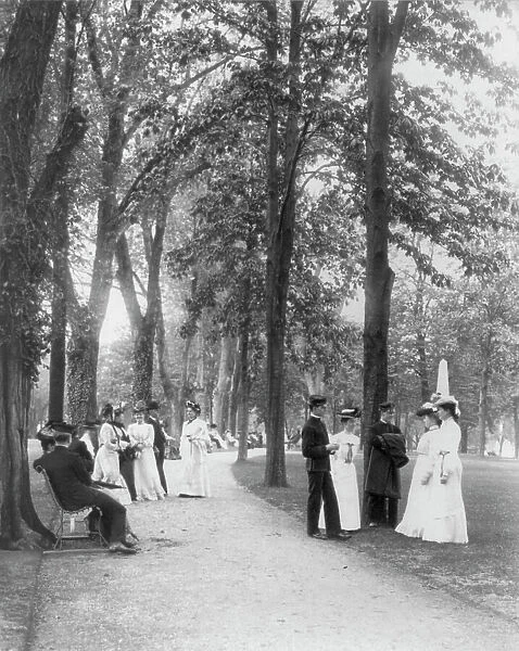 U.S. Naval Academy, Annapolis, Md. 1902?: midshipmen and visitors on grounds, (1902?). Creator: Frances Benjamin Johnston