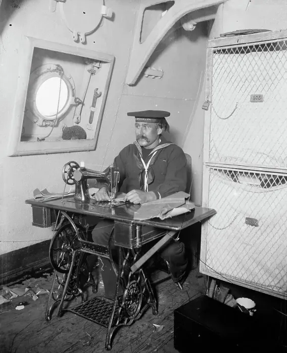Framed Print : U.S.S. Brooklyn, ship's tailor, between 1896 and 1899. Creator: Unknown Framed Print : U.S.S. Brooklyn, ship's tailor, between 1896 and 1899. Creator: Unknown