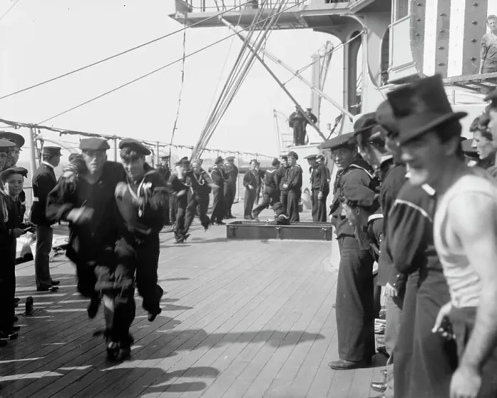 Framed Print : U.S.S. New York, 3 legged race, anniversary of Santiago, 1899 July 3. Creator: Unknown