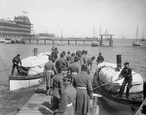 U.S.S. New York, band going aboard at Hampton Roads, between 1893 and 1901. Creator: Edward H Hart