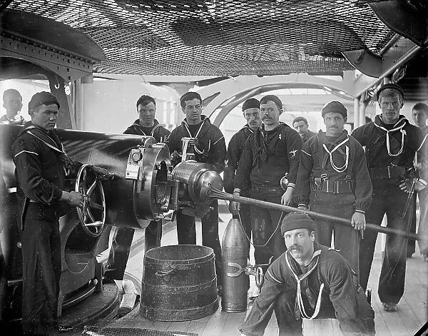 U.S.S. New York, breech of 8 inch gun and crew, between 1893 and 1901. Creator: William H. Jackson