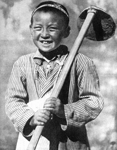 Uzbek schoolboy working on a farm, 1936