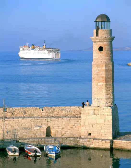 Framed Print : Venetian lighthouse and the ferry to Piraeus, Rethymnon, Crete, Greece Framed Print : Venetian lighthouse and the ferry to Piraeus, Rethymnon, Crete, Greece