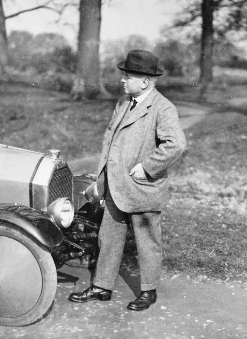 Framed Print : Victor Holroyd with a Triumph car Framed Print : Victor Holroyd with a Triumph car