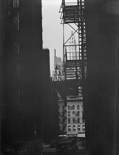 View between buildings of Mather Building / Tower in distance. Chicago, Illinois, c1896-c1942. Creator: Arnold Genthe