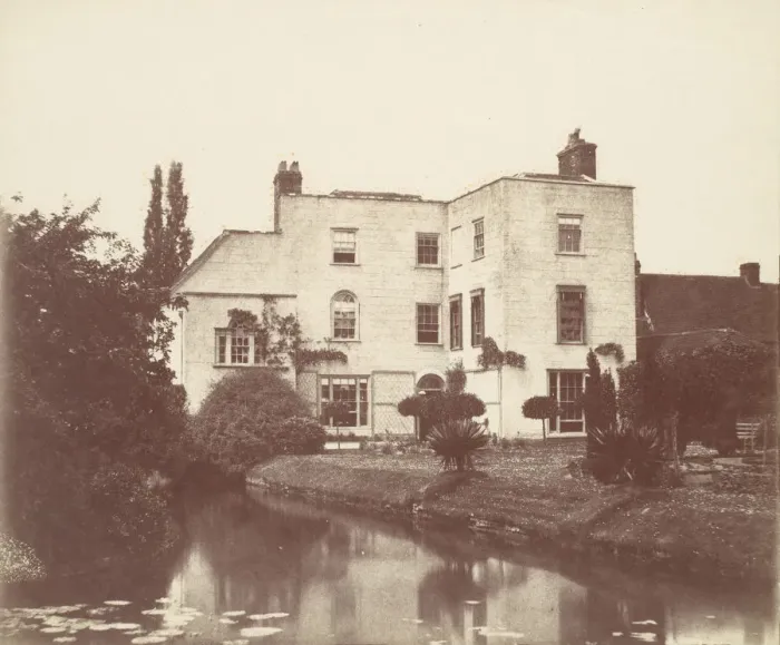 Framed Print : View of House from Garden by Pond with Lily Pads, 1850s. Creator: Unknown