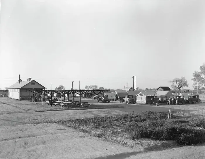 Framed Print : View of Kern migrant camp showing outdoor clubroom with protection from the sun, California, 1936. Creator: Dorothea Lange