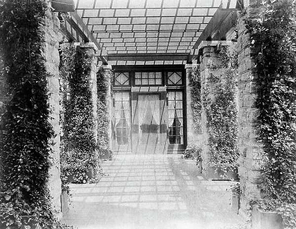 View of pergola, toward door, to home of Edmund Cogswell Converse, Greenwich, Connecticut, 1908. Creator: Frances Benjamin Johnston