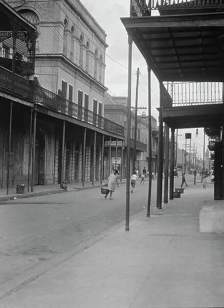 View down Royal Street to the 'Haunted House' (Lalaurie House), New Orleans, between 1920 and 1926. Creator: Arnold Genthe. View down Royal Street to the 'Haunted House' (Lalaurie House), New Orleans, between 1920 and 1926