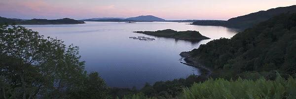 View over Seil Sound to a salmon farm and Luing, Slate Islands, Argyll and Bute, Scotland