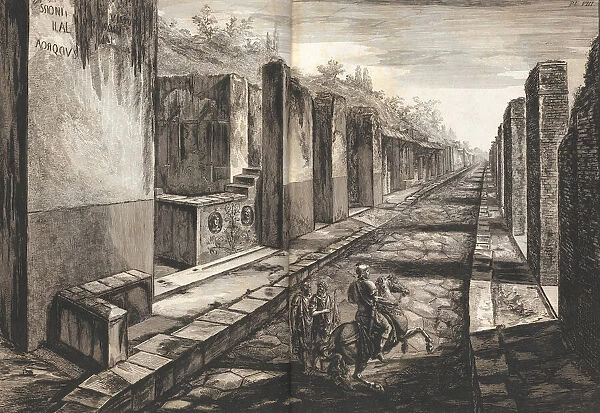 View from the street entering beneath the gateway to the city of Pompeii