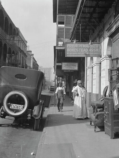 View down a street, New Orleans, between 1920 and 1926. Creator: Arnold Genthe