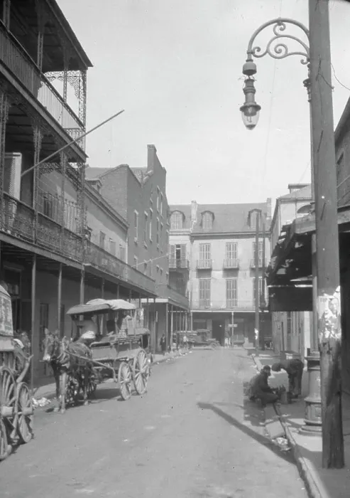 Framed Print : View down a street, New Orleans or Charleston, South Carolina, between 1920 and 1926. Creator: Arnold Genthe Framed Print : View down a street, New Orleans or Charleston, South Carolina, between 1920 and 1926. Creator: Arnold Genthe