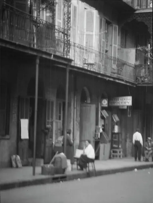 Framed Print : View from across street of people under a covered sidewalk, New Orleans, between 1920 and 1926. Creator: Arnold Genthe Framed Print : View from across street of people under a covered sidewalk, New Orleans, between 1920 and 1926. Creator: Arnold Genthe