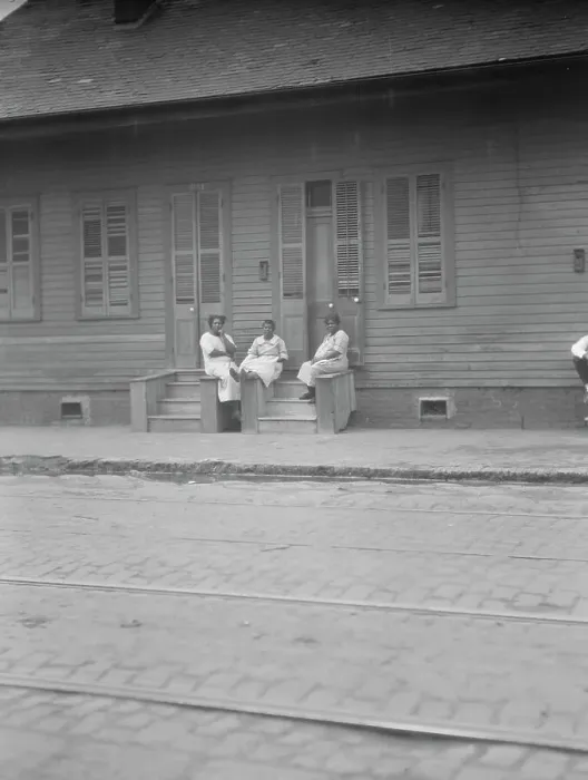 Framed Print : View from across street of three women talking, New Orleans or Charleston, South Ca. c1920-c1926. Creator: Arnold Genthe Framed Print : View from across street of three women talking, New Orleans or Charleston, South Ca. c1920-c1926. Creator: Arnold Genthe