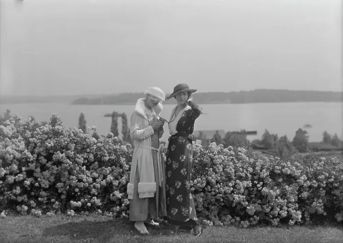 Framed Print : Viola Kraus and Helen Freeman standing outdoors, 1915 June. Creator: Arnold Genthe Framed Print : Viola Kraus and Helen Freeman standing outdoors, 1915 June. Creator: Arnold Genthe