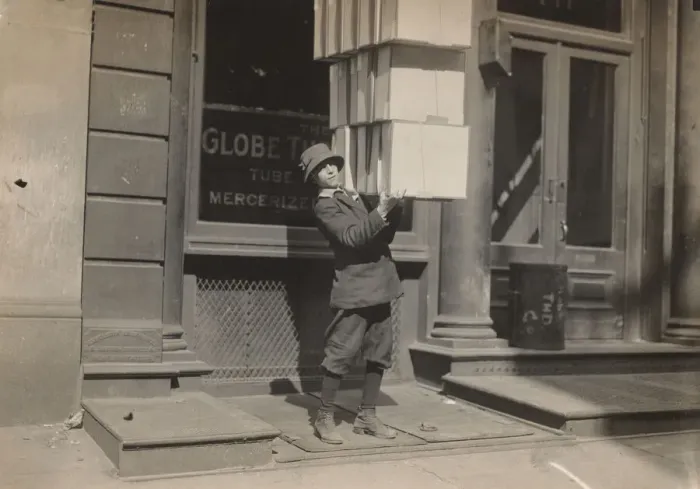 Framed Print : Wagon boy or tail boy'helping to load the wagon, c. 1914